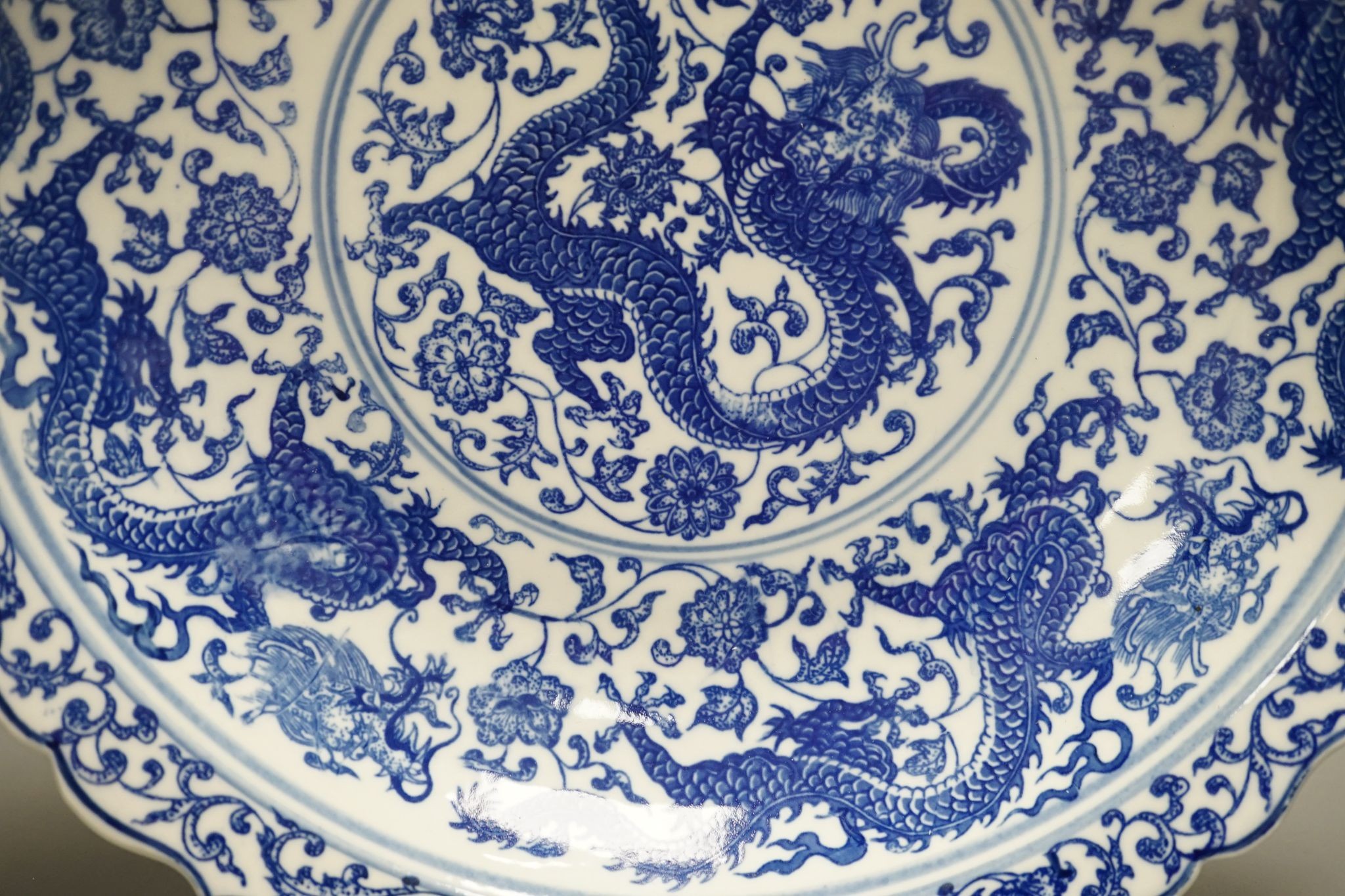 A Chinese blue and white ‘dragon’ dish 31cm